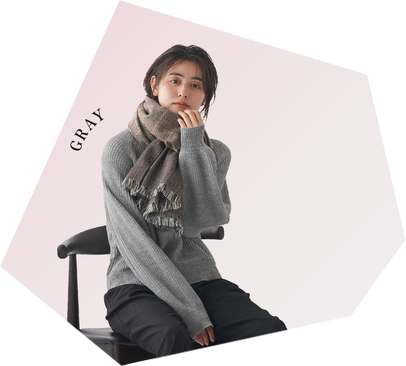 The heathered gray creates a sophisticated look. The ribbed knit makes this a trendy knit piece that can be worn on its own.